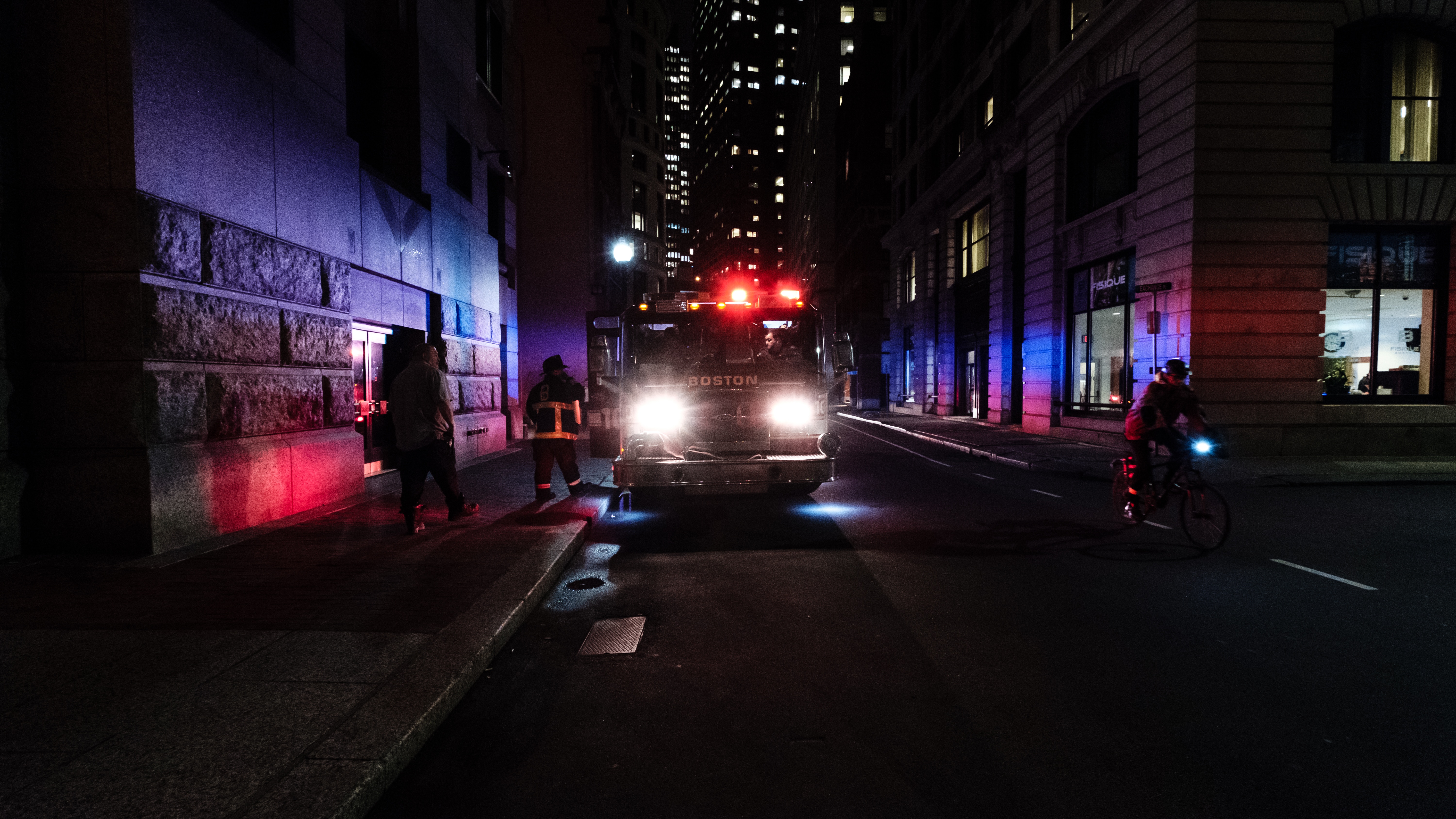 fire engine on city street at night