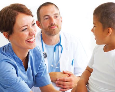 Health care professionals with child